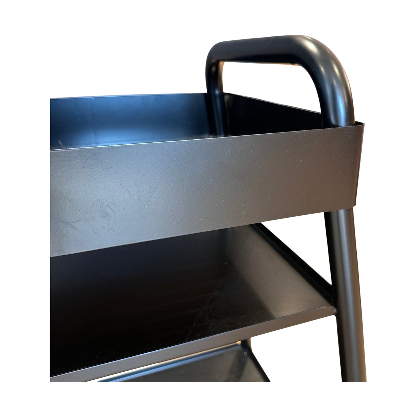 Tralle på hjul i svart metall