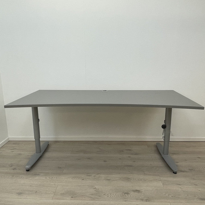 Manuell hev/senk skrivebord med grå bordplate