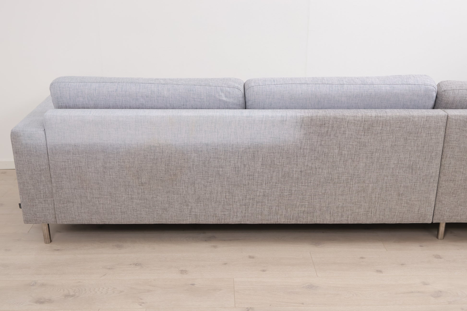 Nyrenset | Grå Bolia Scandinavia hjørnesofa med puff