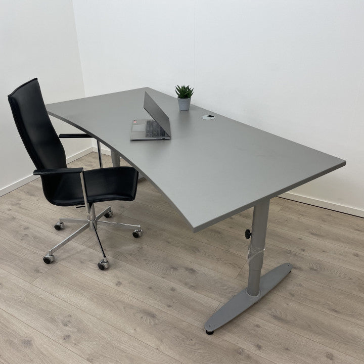 Manuell hev/senk skrivebord med grå bordplate