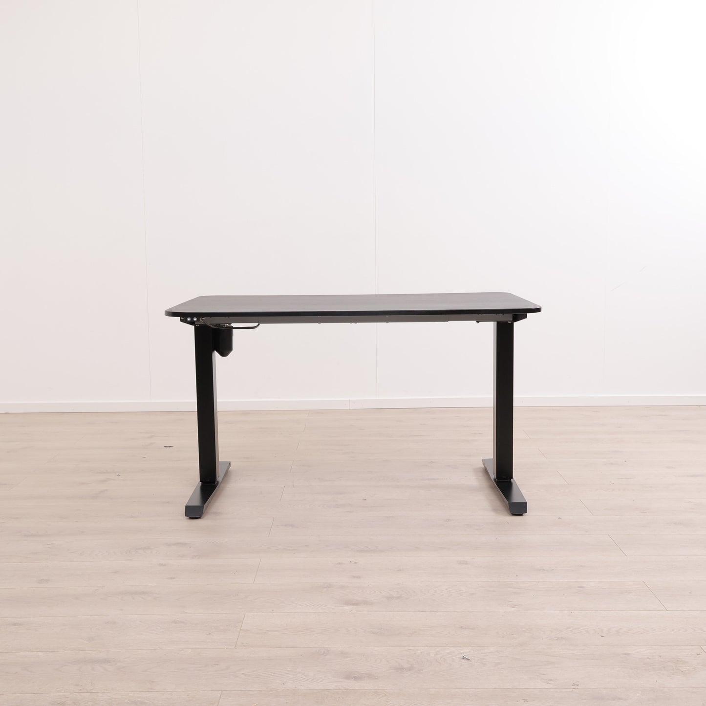 Helsort elektrisk hev/senk skrivebord. 120x80 cm