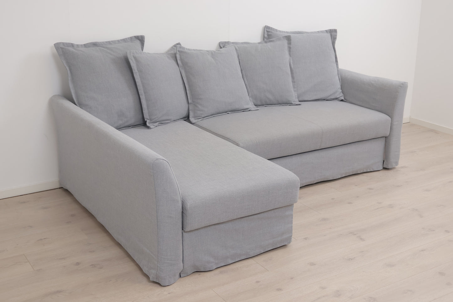 Nyrenset | IKEA Holmsund sovesofa med sjeselong og oppbevaring