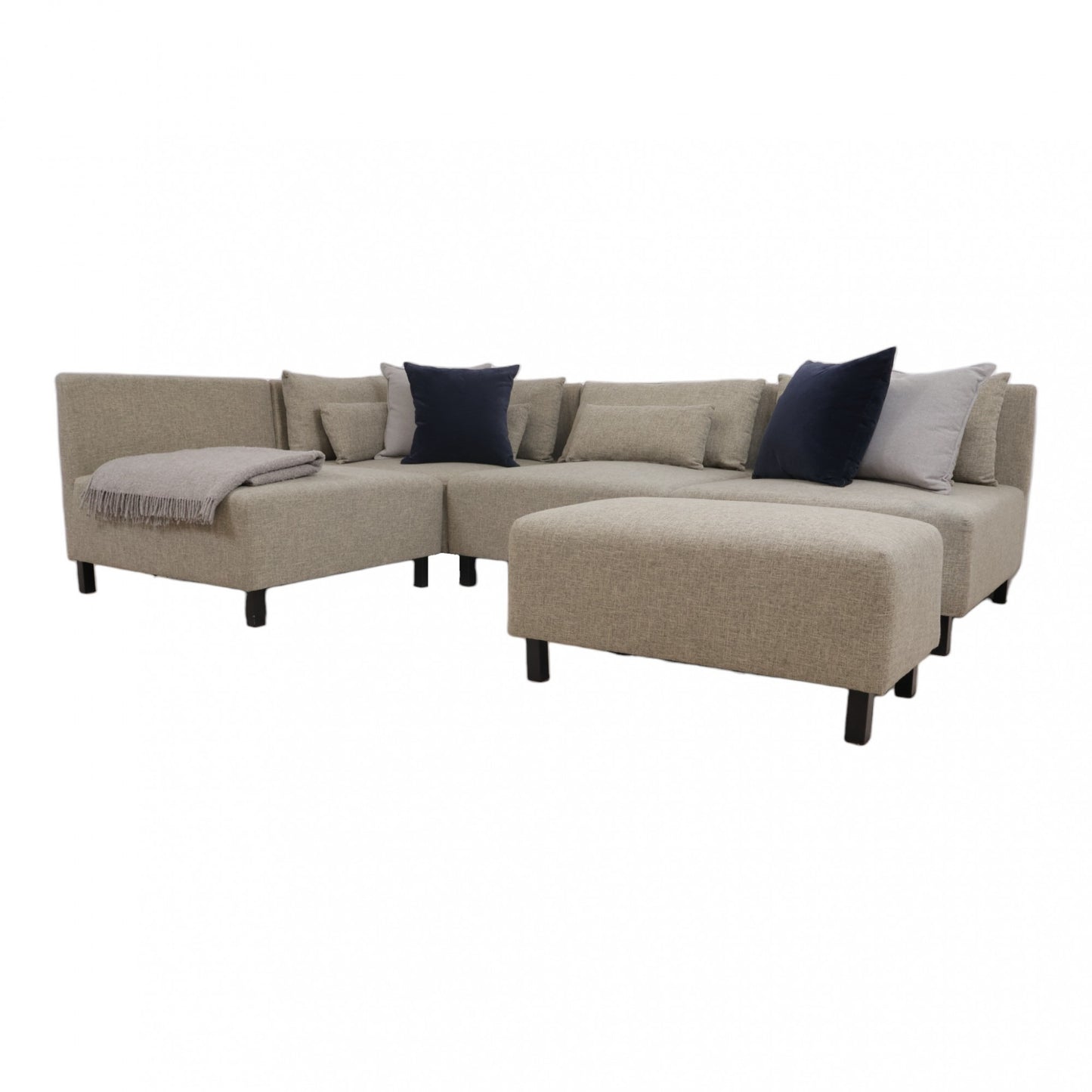 Nyrenset | Beige modulsofa med puff fra House Doctor