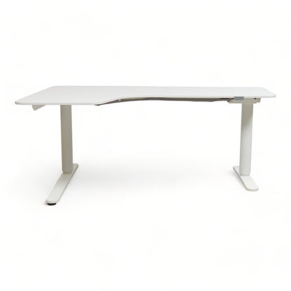 Elektrisk hev/senk Bekant hjørnebord fra IKEA, venstre. 160x110