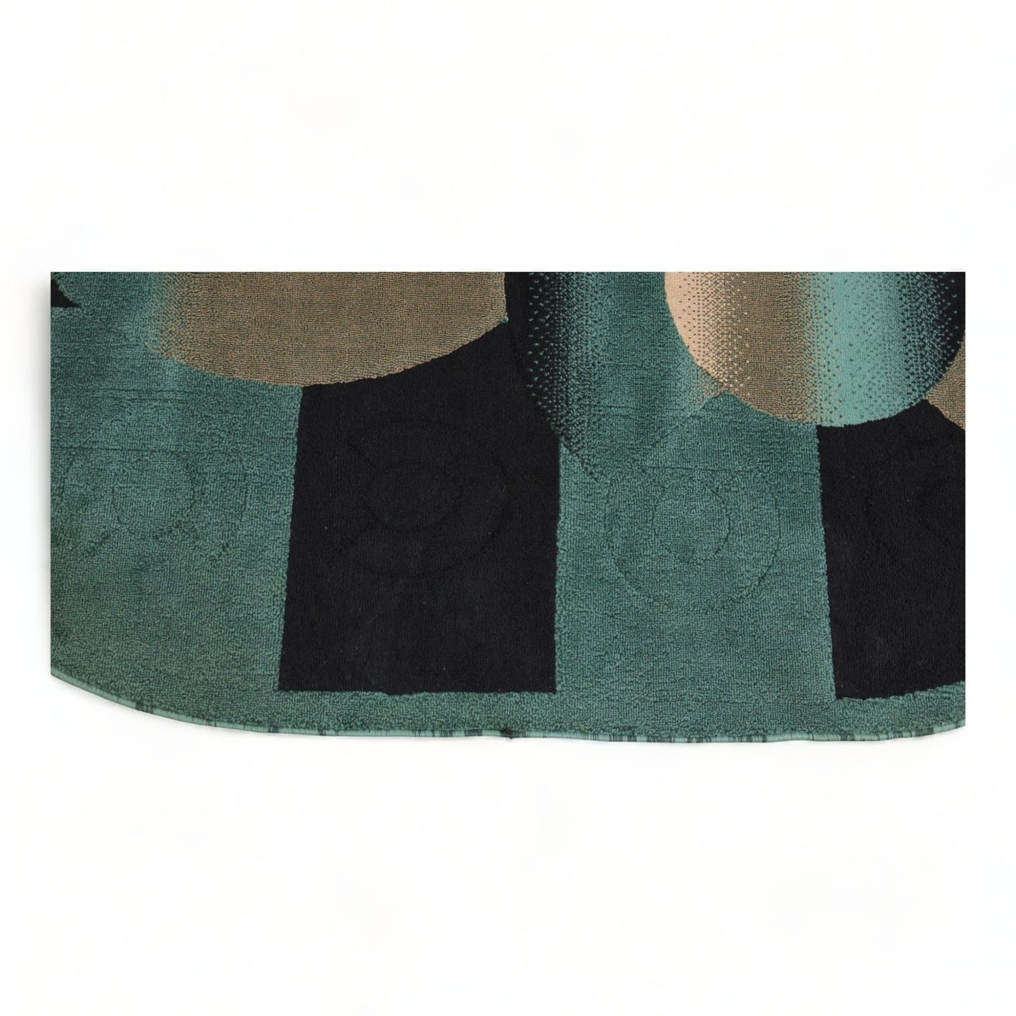Nyrenset | Grønn og svart mønstrete teppe