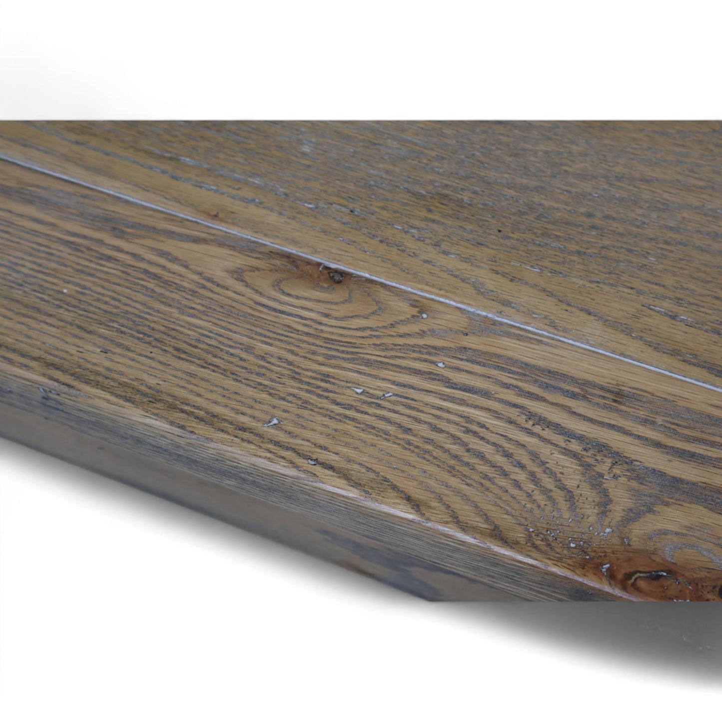 Stort spisebord i gråvasket eik med to ileggsplater