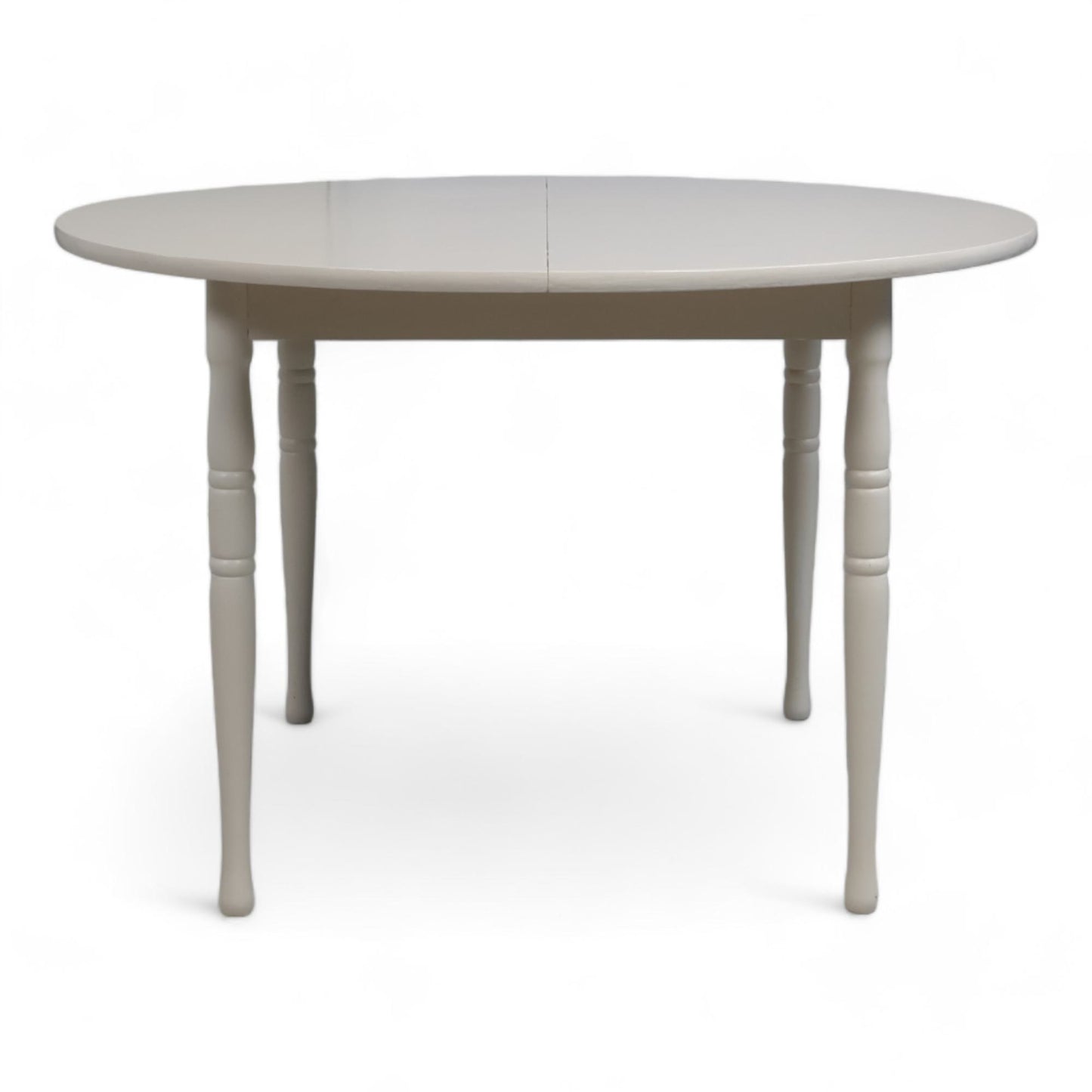 Hvitt rundt spisebord i tre med ileggsplate ø1120cm