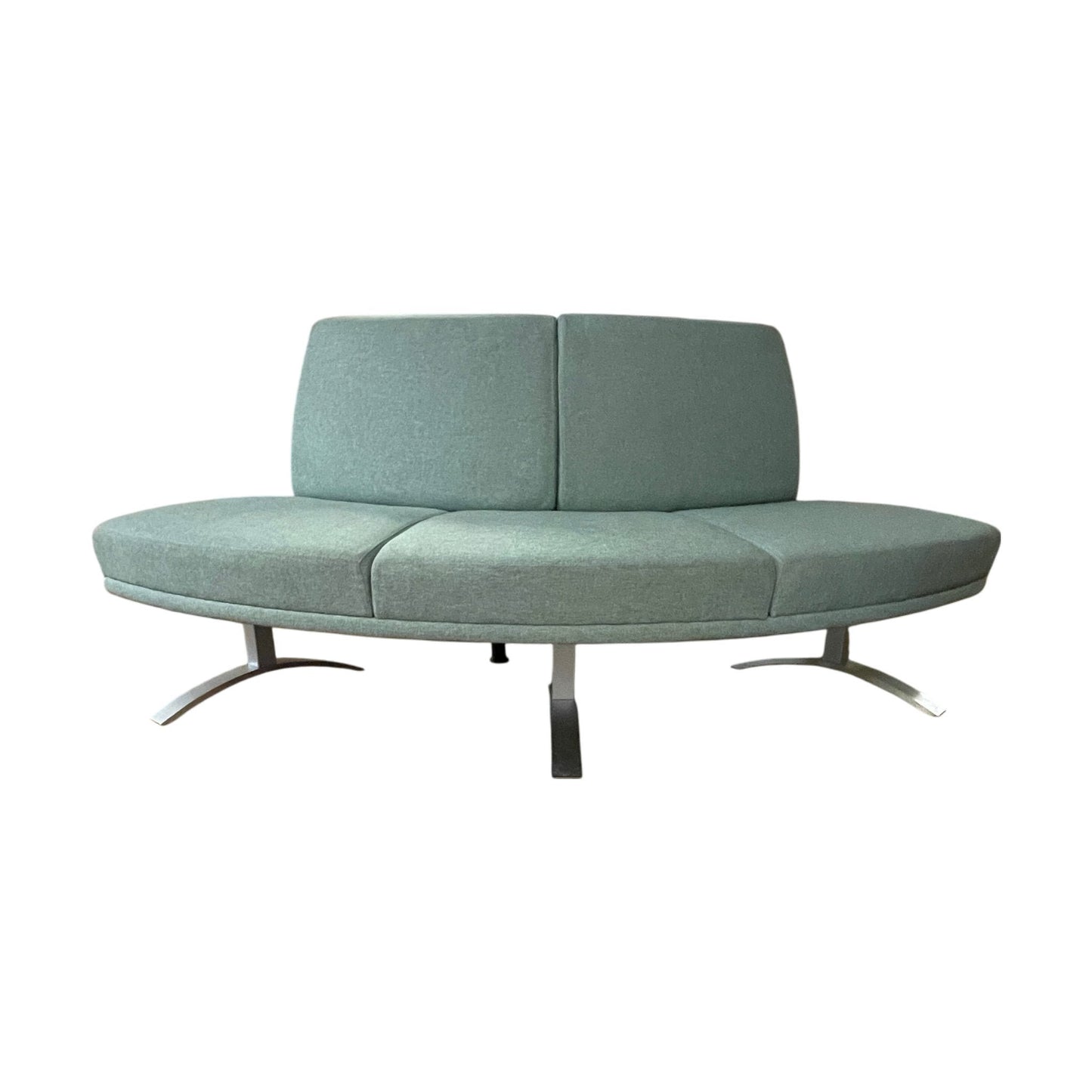 Retro loungesofa i dus grønn, med buet rygg