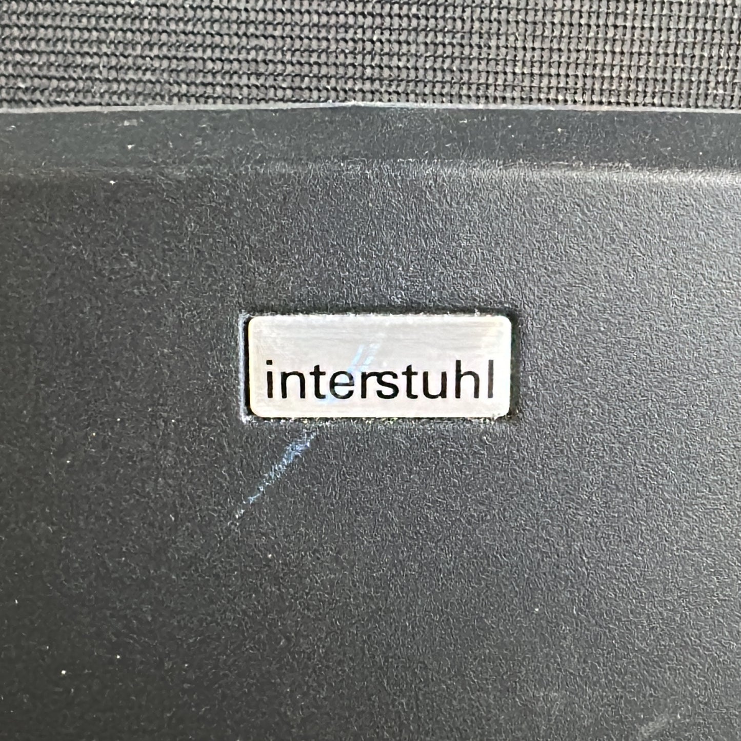 Kontorstol fra Interstuhl i svart, nettrygg