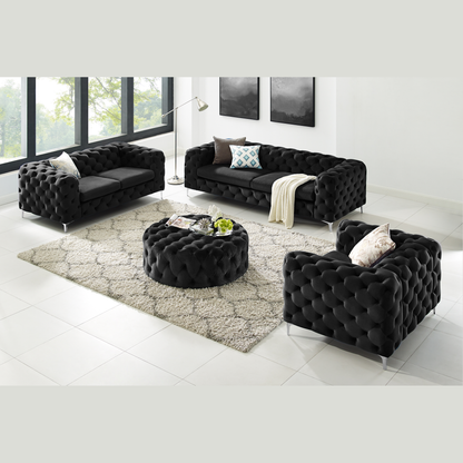 Bella Sofa fra A-Møbler i svart, chesterfield-knapping i velur